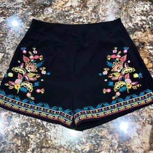 Lydelle Women Black Shorts S black with floral accents zip back